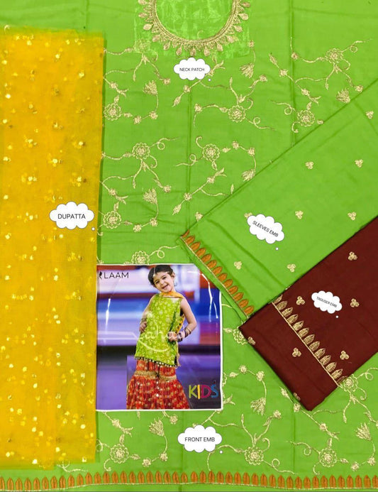 Green and yellow saree with a child model wearing it, on a green background.