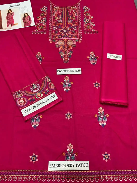 Red fabric with intricate embroidery and labels indicating parts of the garment.