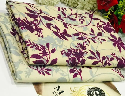 Folded fabric with purple floral pattern on a white background