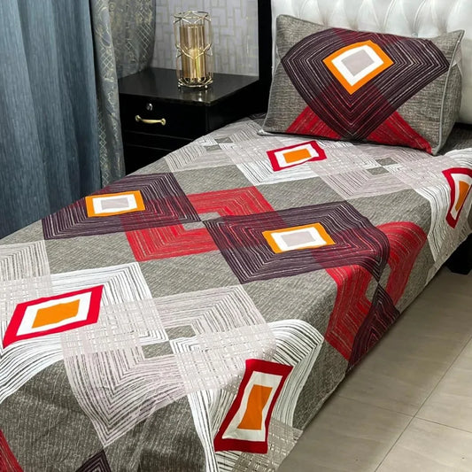 Bedspread with geometric pattern on a bed in a bedroom setting