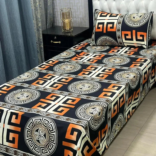 Bed with geometric patterned bedspread in a bedroom setting
