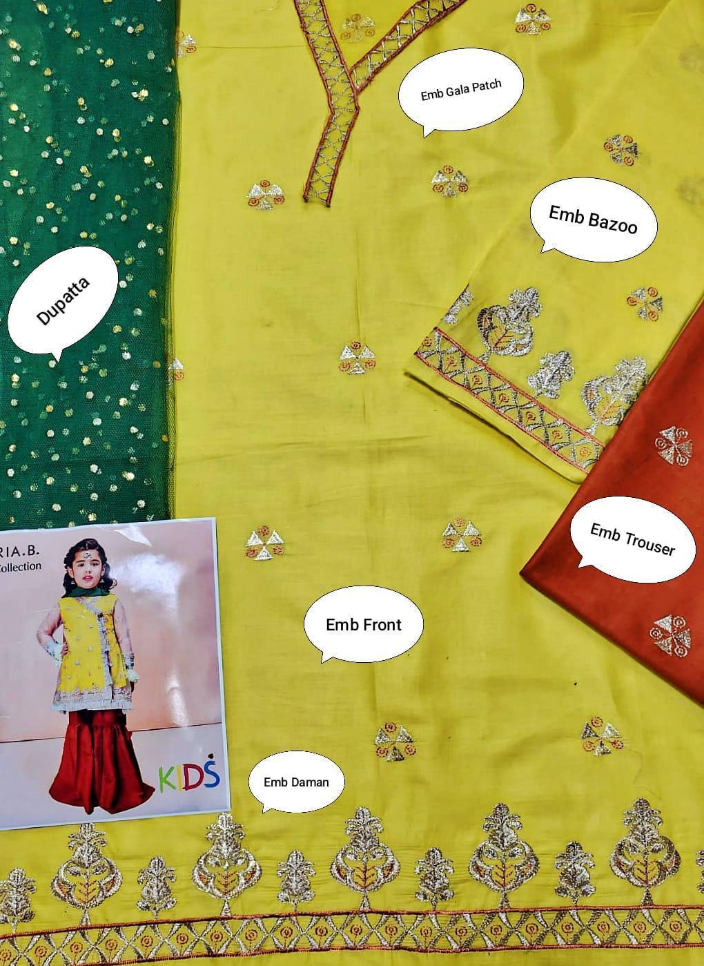 Yellow fabric with embroidery and a child model wearing yellow top and red pants.
