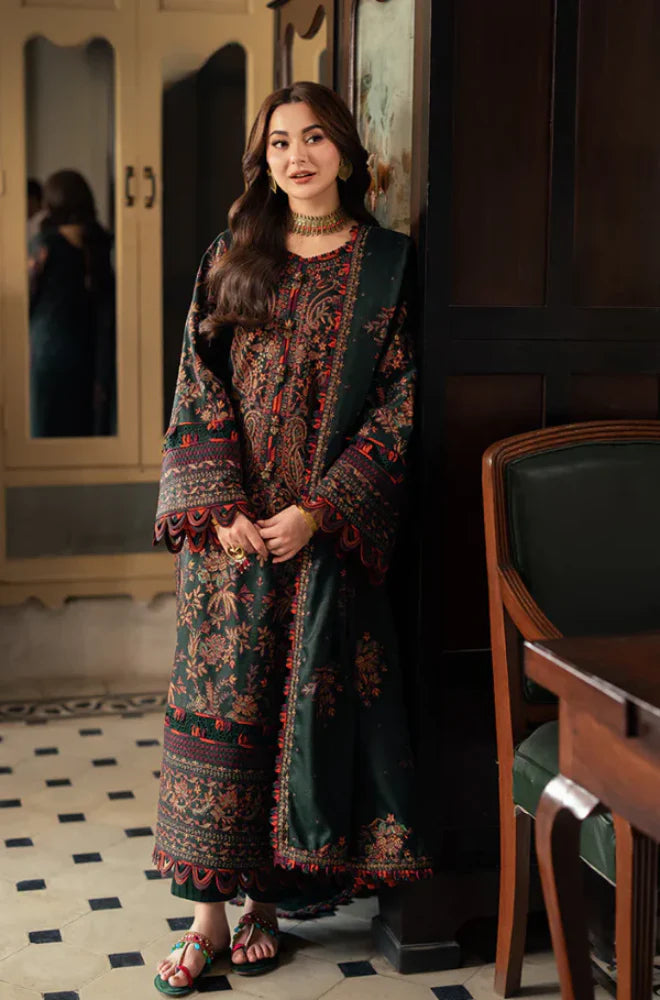 Woman in a traditional outfit standing in a room with wooden furniture.