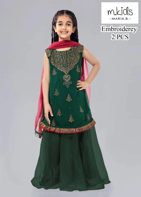 Young girl wearing a green embroidered outfit with a pink dupatta, standing against a gray background. Brand 'mkids' visible.