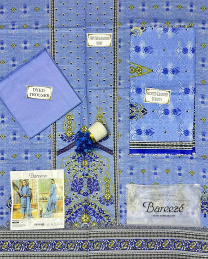Blue fabric with intricate patterns and Bareeze branding, including a spool of thread and a label.