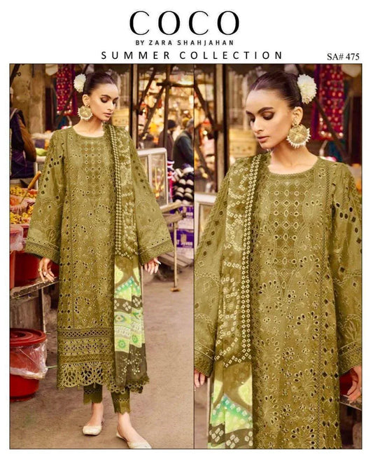 Two models wearing green embroidered outfits with 'Coco by Zara Shahnijan' branding.