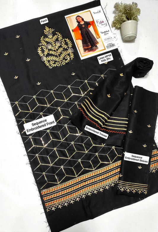 Black fabric with geometric patterns and embroidery on a white background