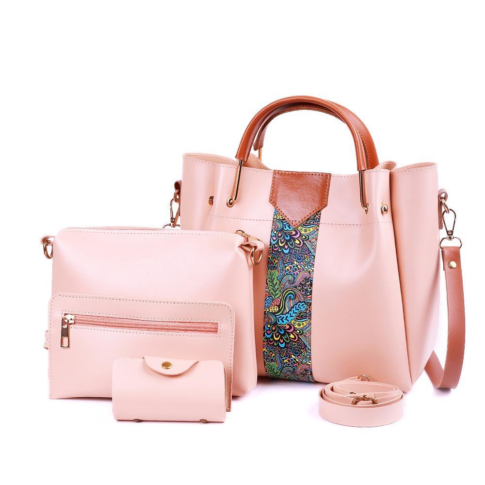 Set of pink handbags with a colorful strap on a white background