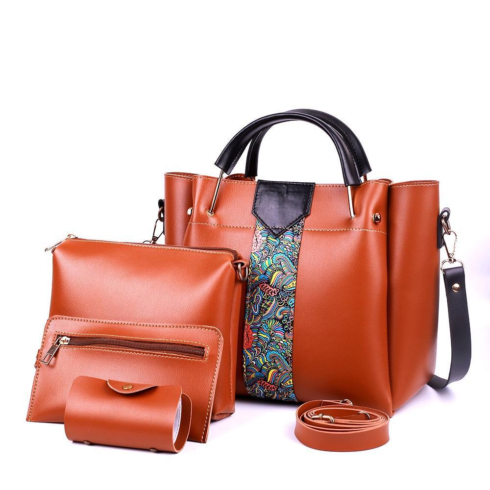 Brown leather handbag set with a smaller pouch and strap on a white background