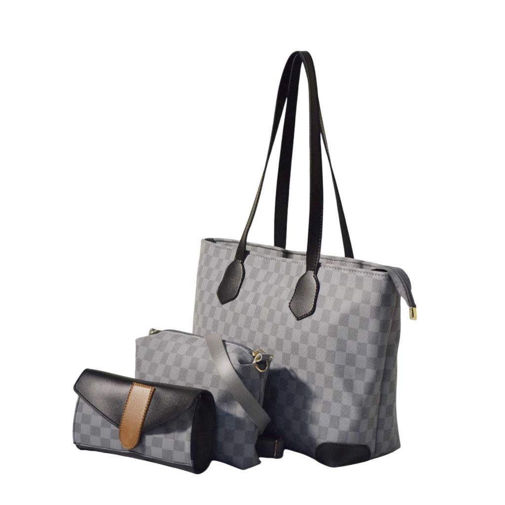 Gray checkered handbag with black handles and a matching pouch on a white background