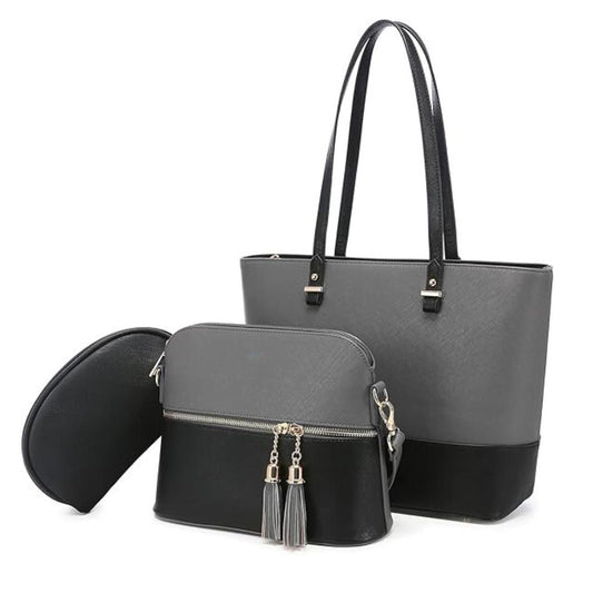 Two-handled gray tote bag with a smaller black bag featuring tassels on a white background