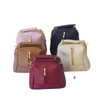 Five bags in different colors on a white background