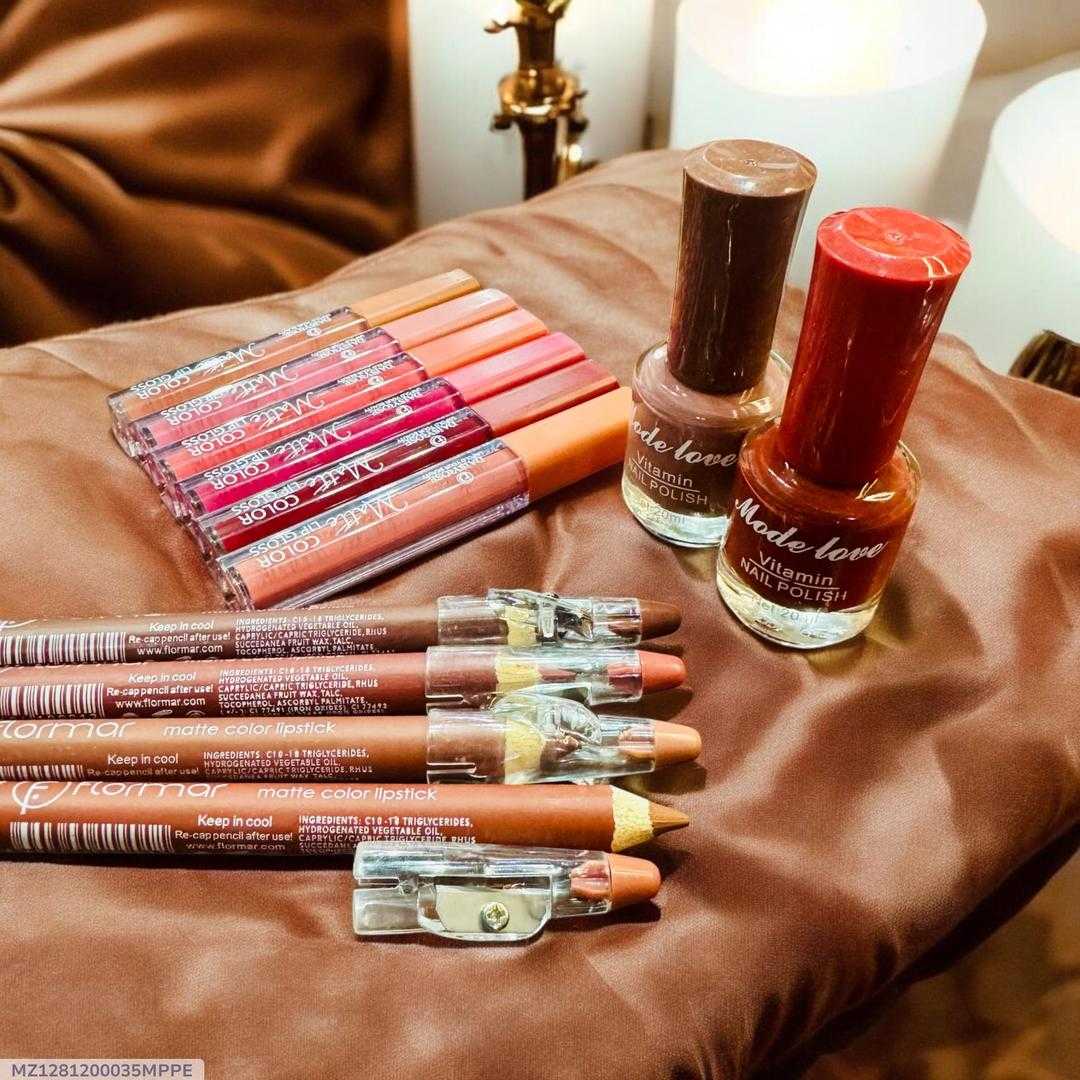 Makeup products including lipsticks, lip gloss, and nail polish on a brown fabric surface.