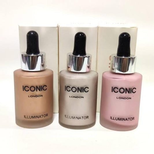 Three bottles of Iconic London Illuminator with dropper caps on a white background