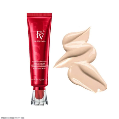 Red cosmetic tube with 'FV' branding and a swatch of beige foundation on a white background