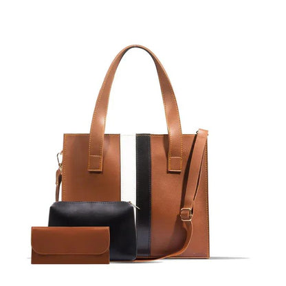 Brown leather handbag with matching wallet on a white background