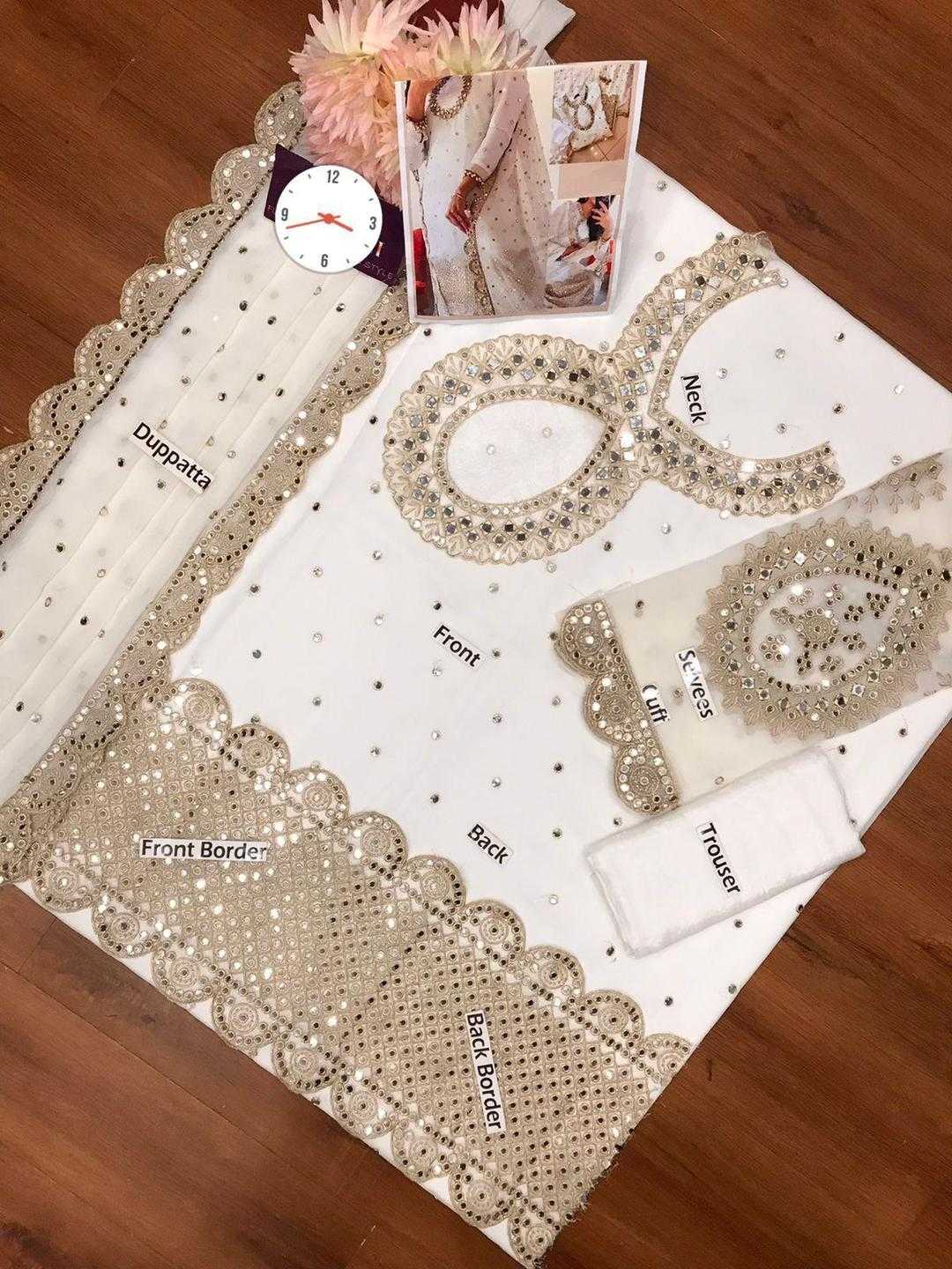 Decorative doily with embroidered text on a wooden surface