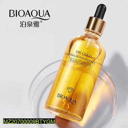 BIOAQUA 24K Gold Hyaluronic Essence bottle on a white background