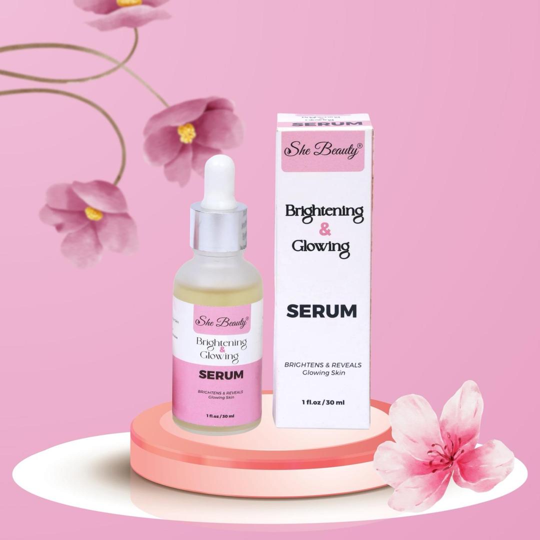 She Beauty Brightening & Glowing Serum with packaging on a pink background with flowers.