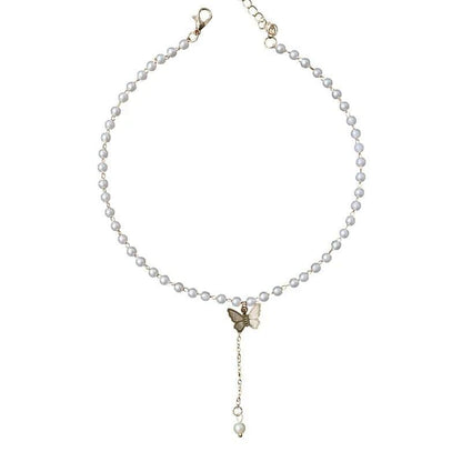 Pearl necklace with a butterfly pendant on a white background