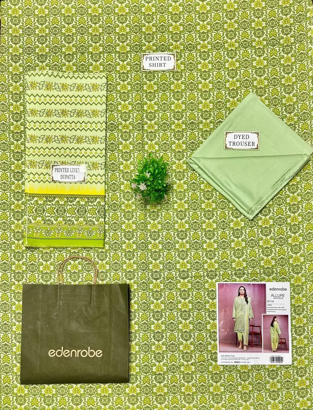 Collection of green clothing and accessories on a patterned background with 'edenrobe' branding.