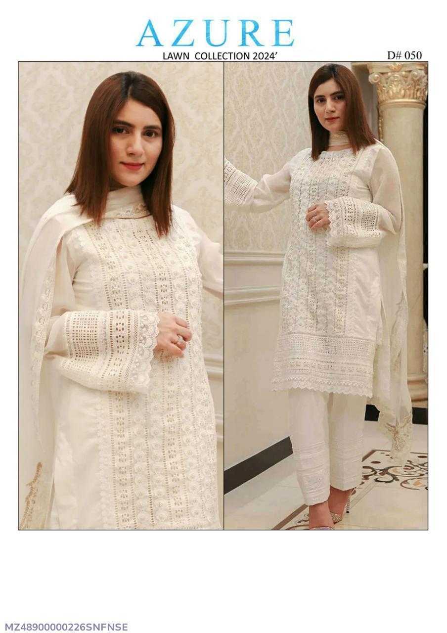 Woman wearing a white outfit with lace details, part of the Azure Lawn Collection 2024.