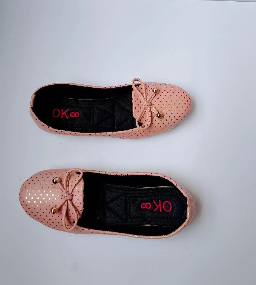 Pair of pink perforated shoes with 'OK' logo on a light gray background