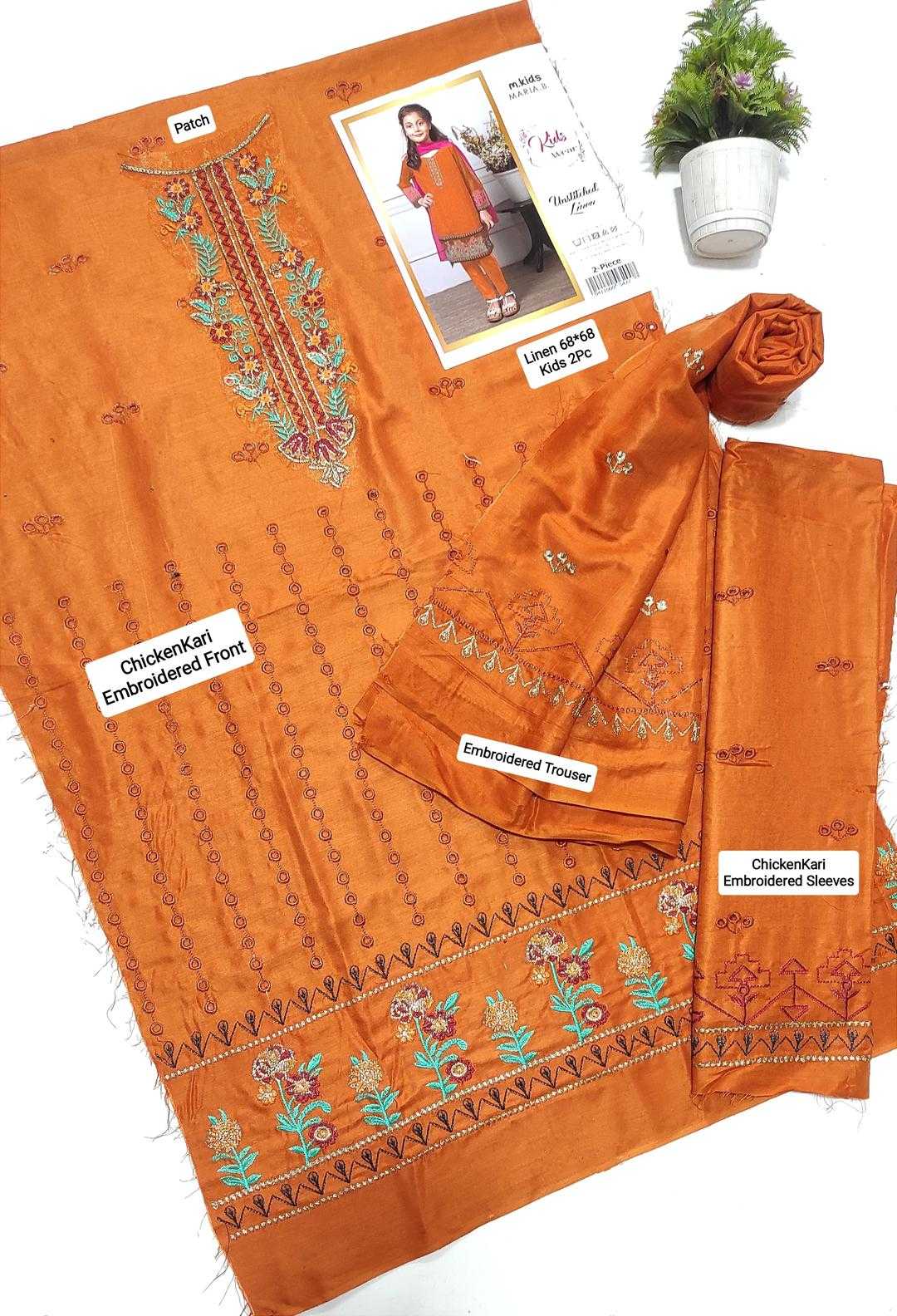 Orange embroidered fabric with labels on a white background