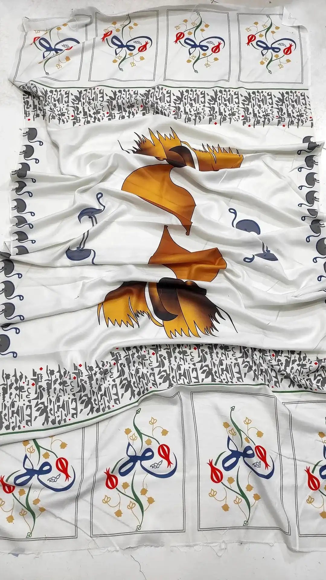 Decorative pillow with bird design on a white background