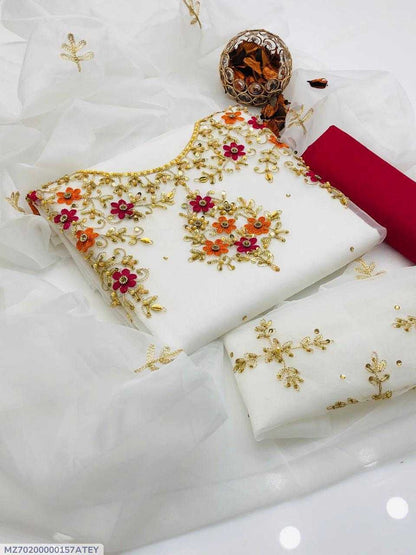 White fabric with gold embroidery on a white background
