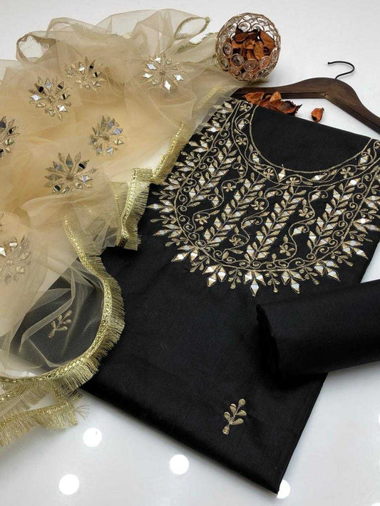 Black saree with gold embroidery and a decorative blouse on a white background