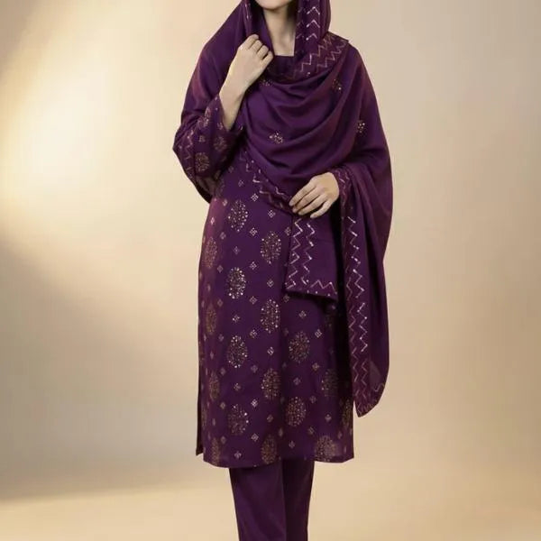 Purple traditional outfit with a matching dupatta on a beige background