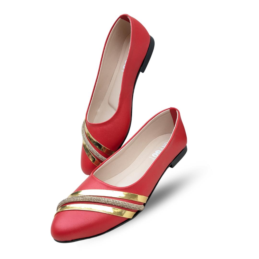 Red shoes with gold accents on a white background