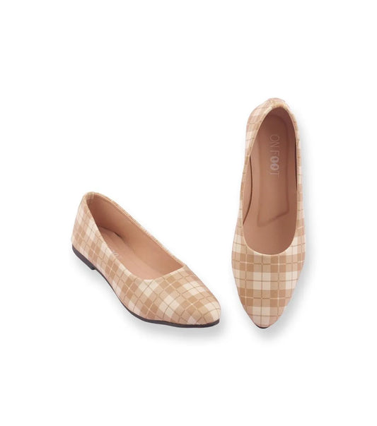 Pair of beige checkered flats on a white background