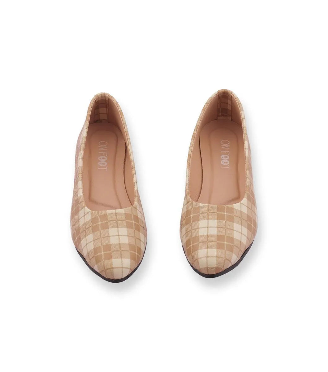 Pair of checkered shoes on a white background