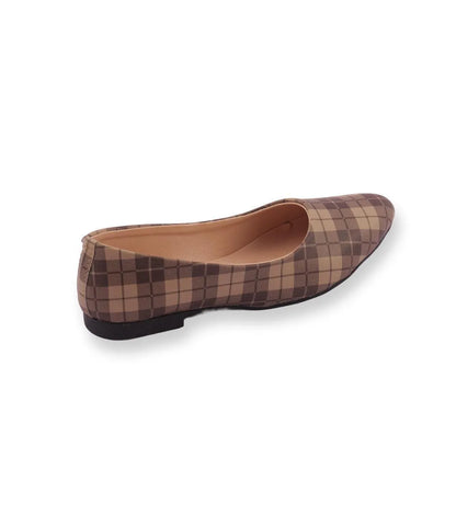 Plaid patterned flat shoe on a white background