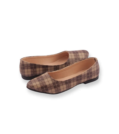 Pair of plaid patterned shoes on a white background