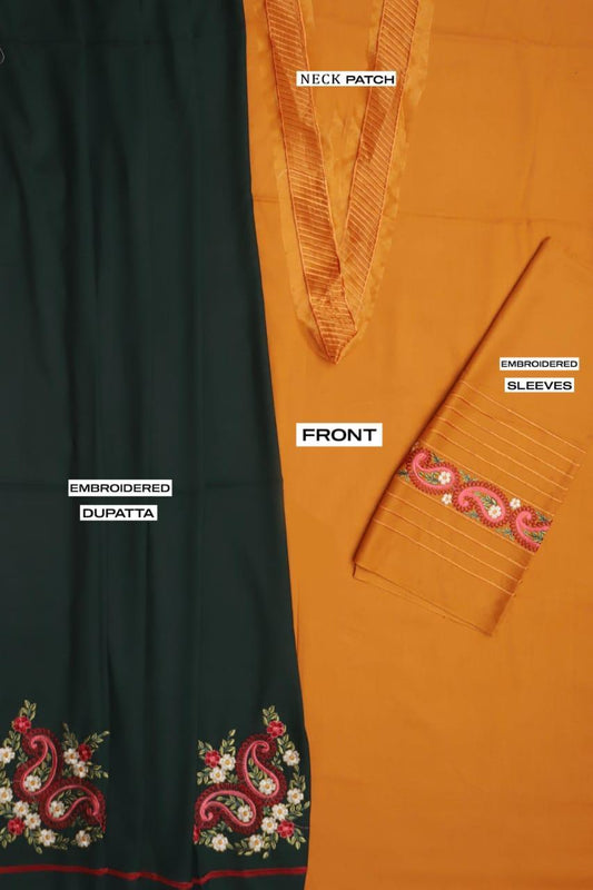 Black and orange embroidered clothing with labels indicating parts of the garment.