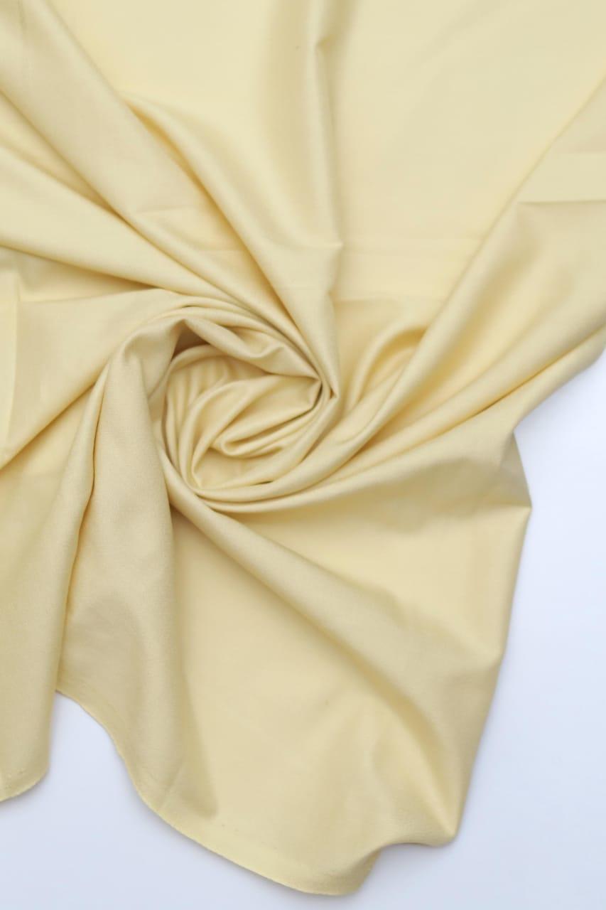 Beige fabric swatch on a white background