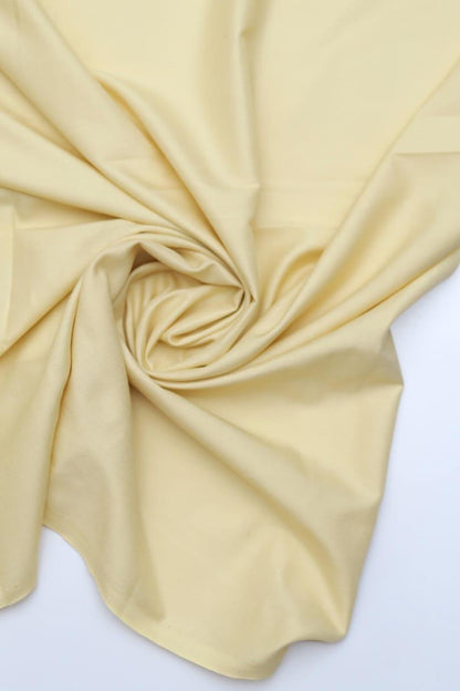 Beige fabric swatch on a white background