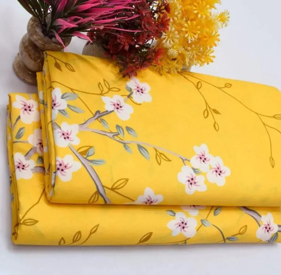 Yellow fabric with floral pattern on a white background
