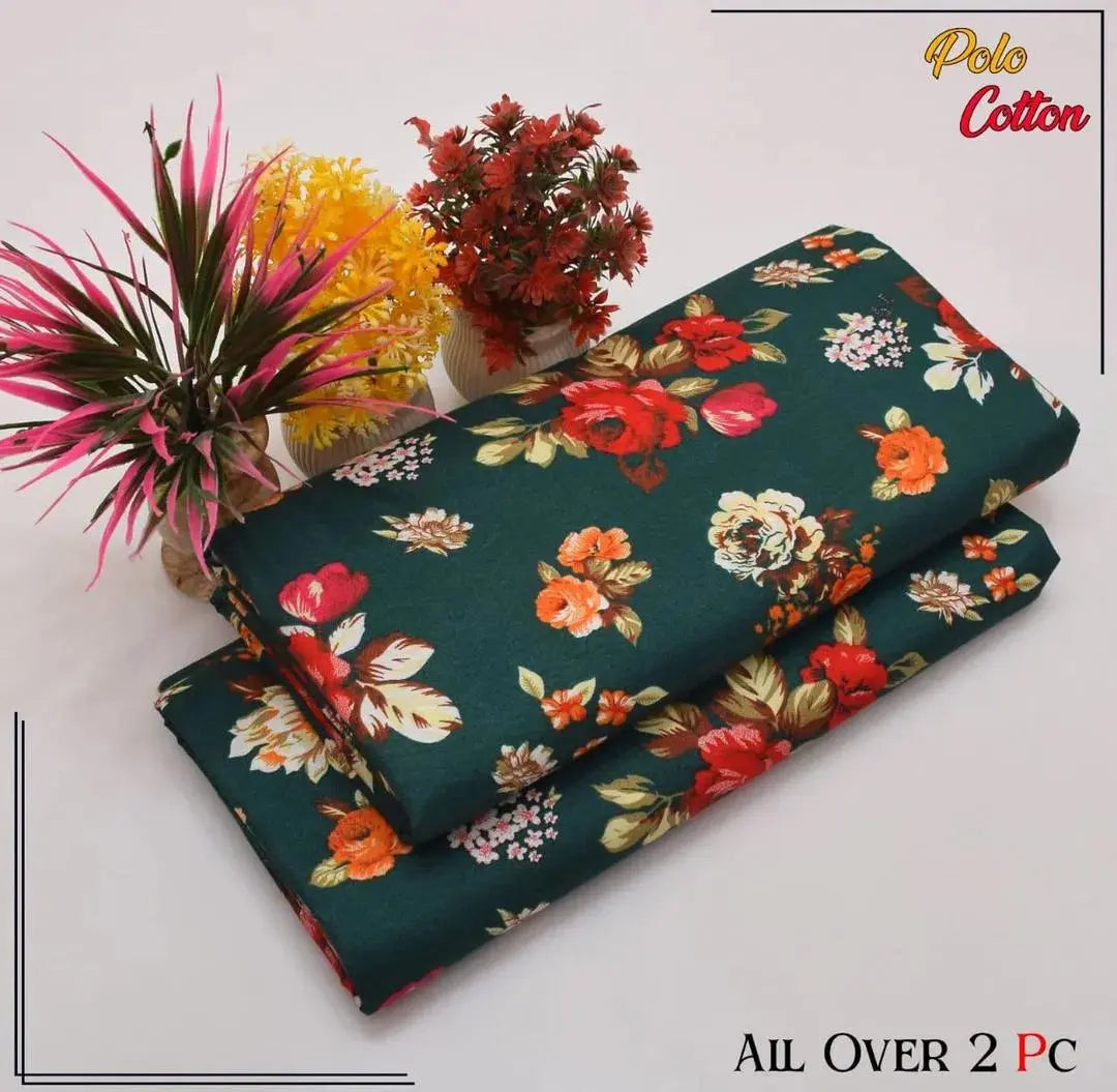 Floral fabric with red, orange, and white flowers on a dark green background, with 'Polo Cotton' branding.