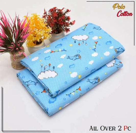 Blue children's quilt with cartoon designs on a white background, featuring the brand 'Polo Cotton'.