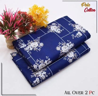 Roll of blue fabric with white floral pattern on a white background, featuring Polo Cotton branding.