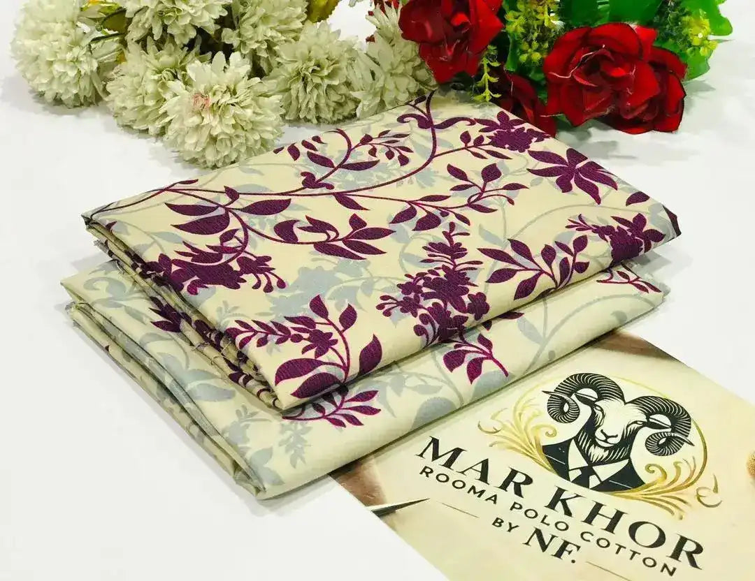 Folded fabric with floral pattern and 'Mar Khor' branding on a white background