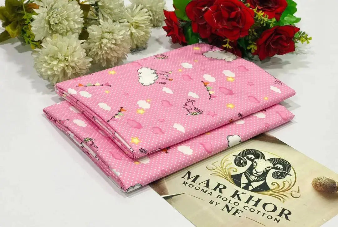 Pink fabric with cartoon designs on a white surface with flowers in the background, featuring the Markhor brand.