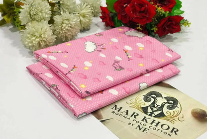 Pink fabric with cartoon designs on a white surface with flowers in the background, featuring the Markhor brand.