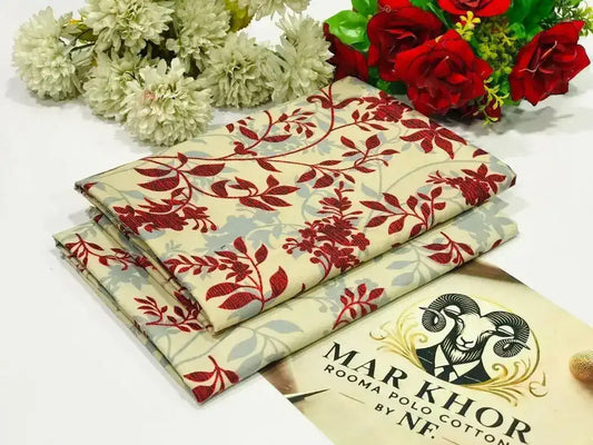 Set of floral-patterned napkins with a brand card in the background