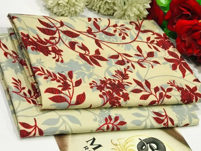 Floral-patterned fabric with red and green flowers on a white background