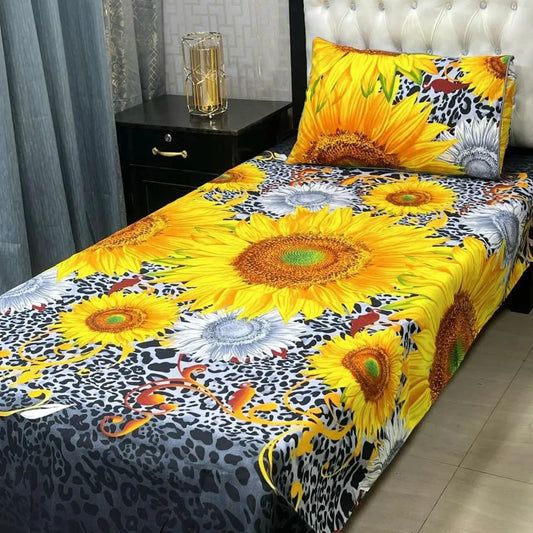Bedspread with sunflower and leopard print design on a bed in a bedroom setting.